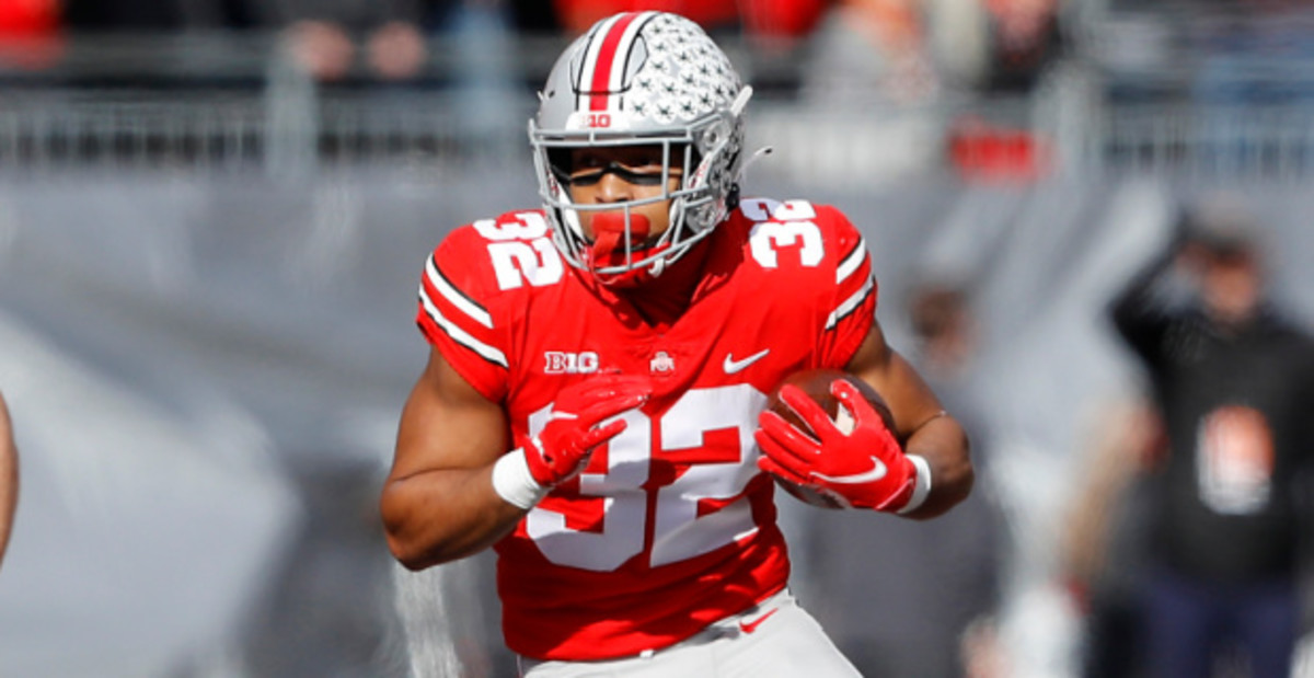 Ohio State Buckeyes running back TreVeyon Henderson on a carry during a college football game in the Big Ten.